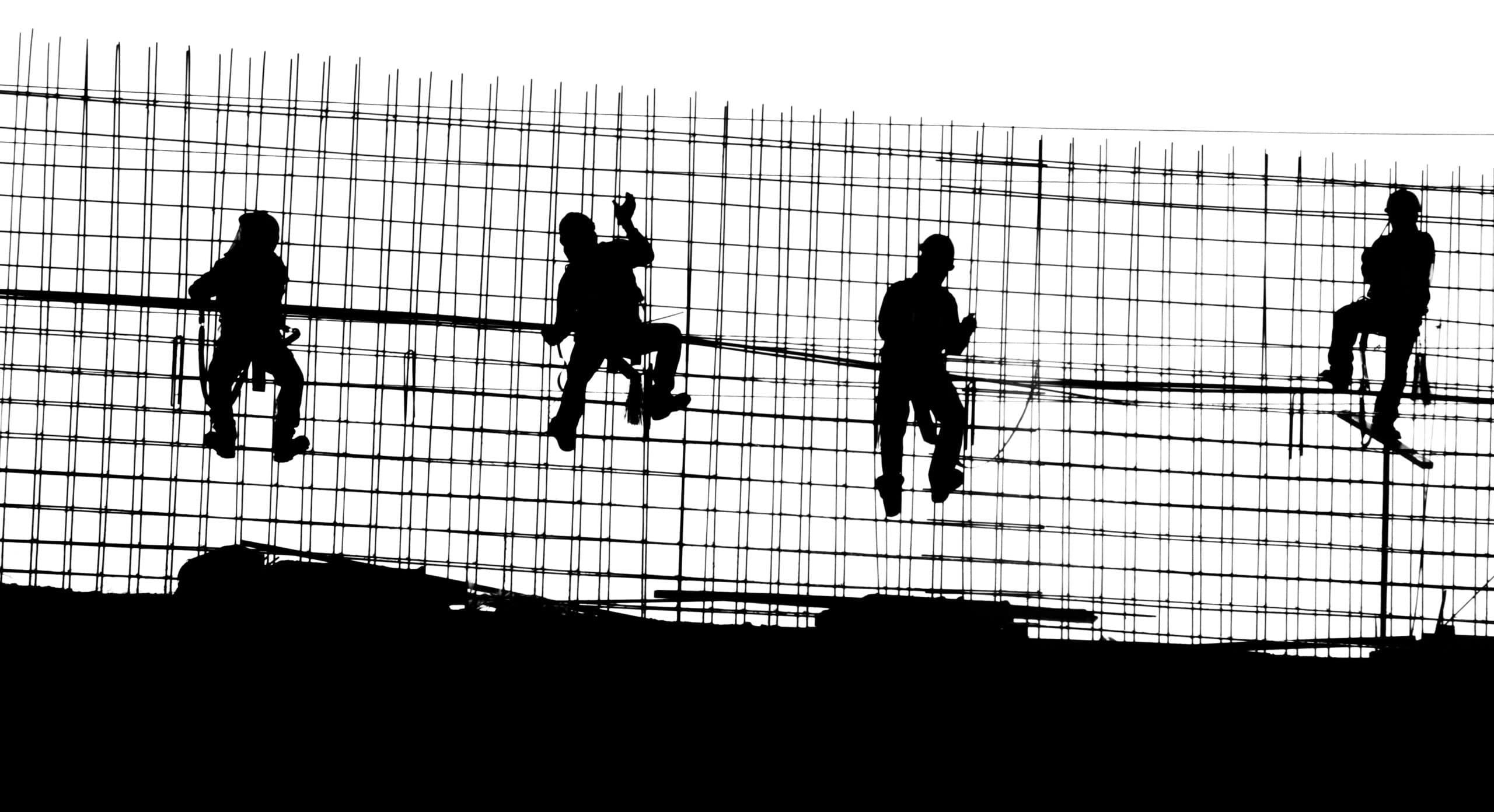 Construction laborers on a residential framing site
