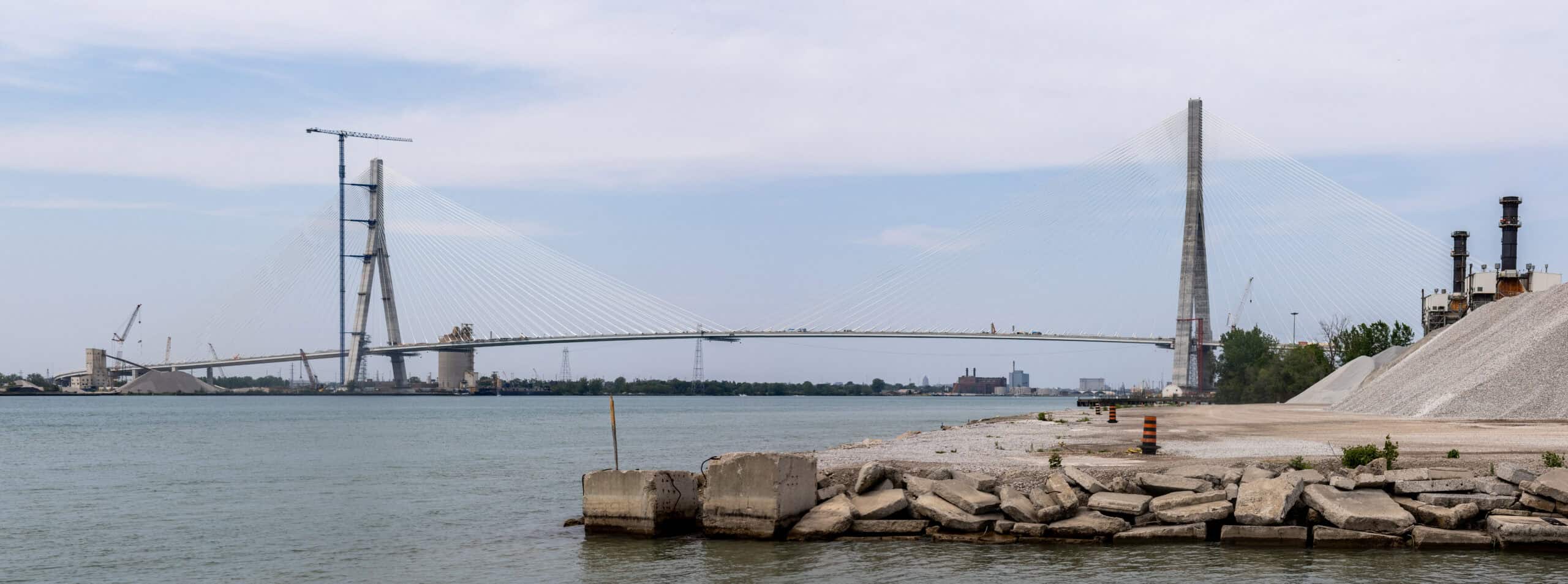Cable-stayed Gordie Howe International Bridge over the Detroit River seen from Windsor, Ontario