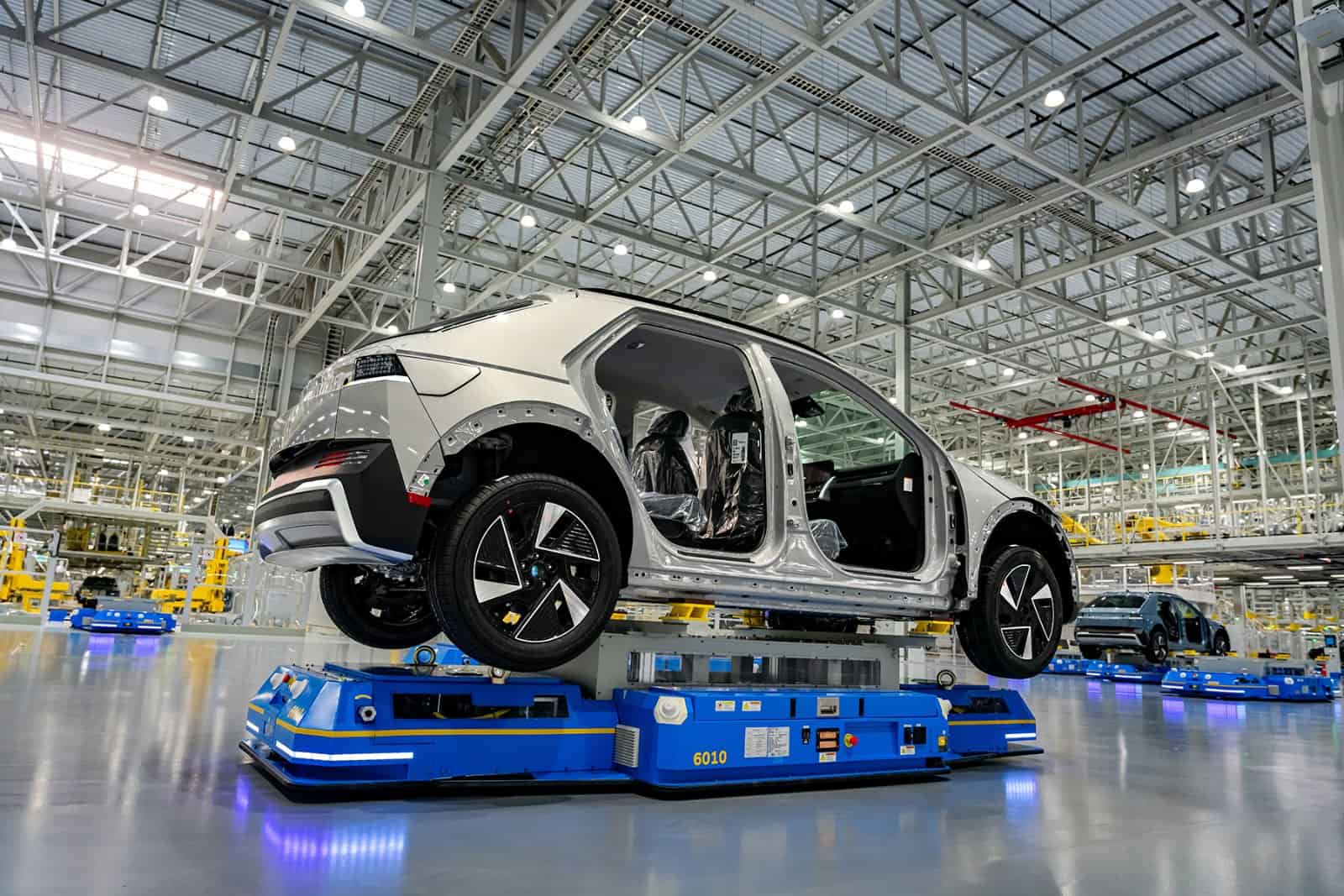 A Hyundai electric SUV body on an automated guided vehicle inside the Metaplant America assembly hall in Georgia