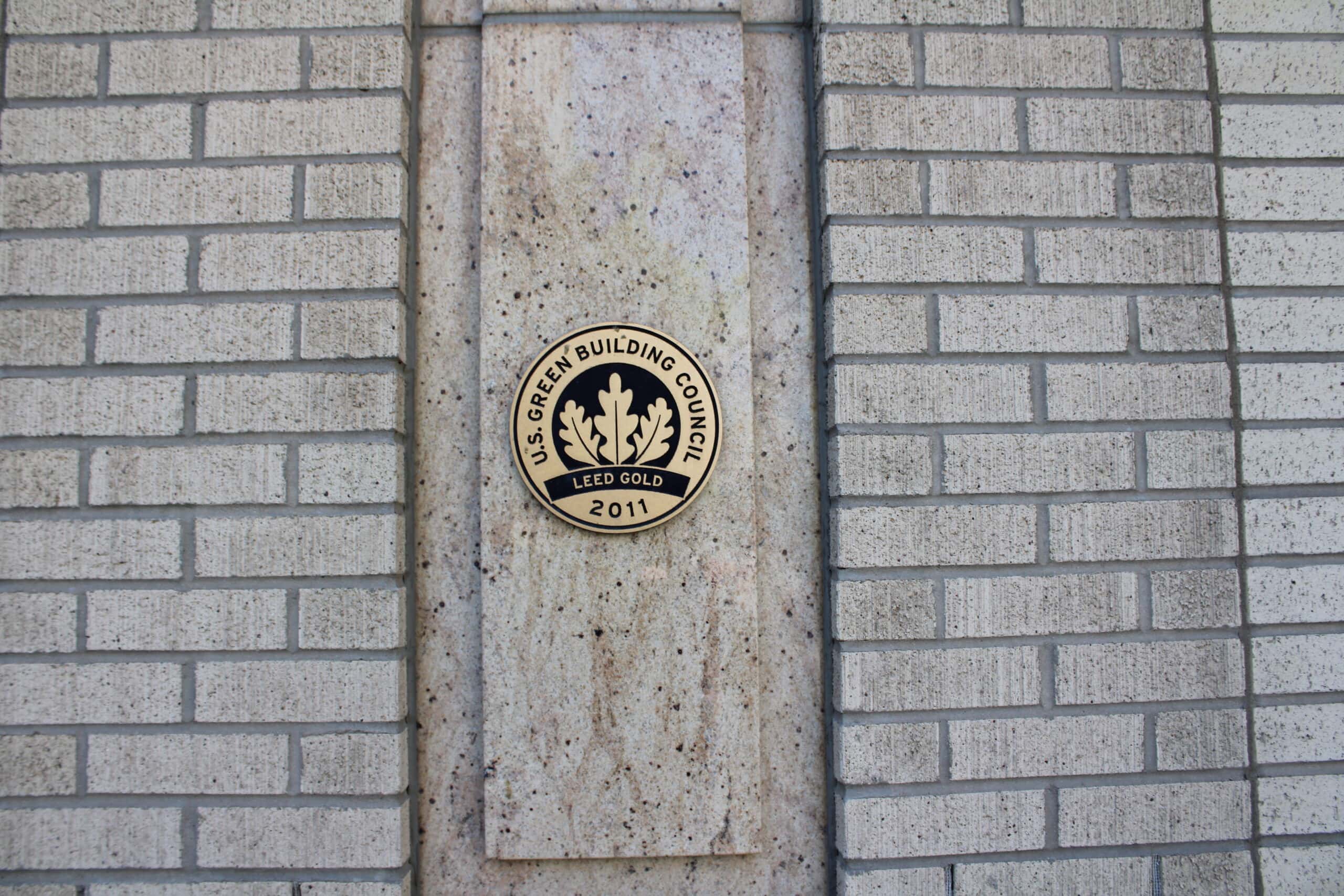LEED Gold certification plaque mounted on a building exterior