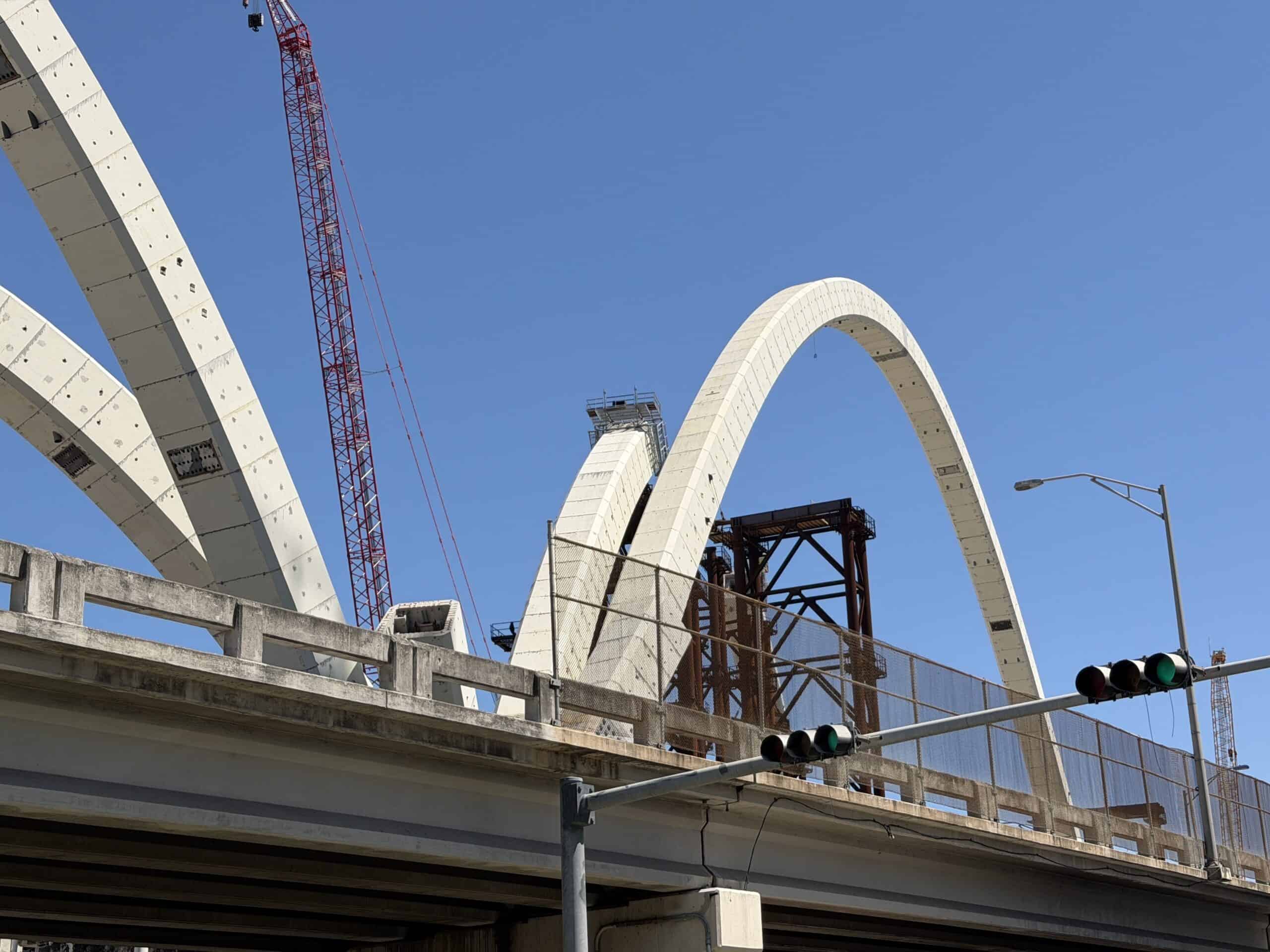 Modern steel and concrete bridge construction at the I-395 Signature Bridge in downtown Miami