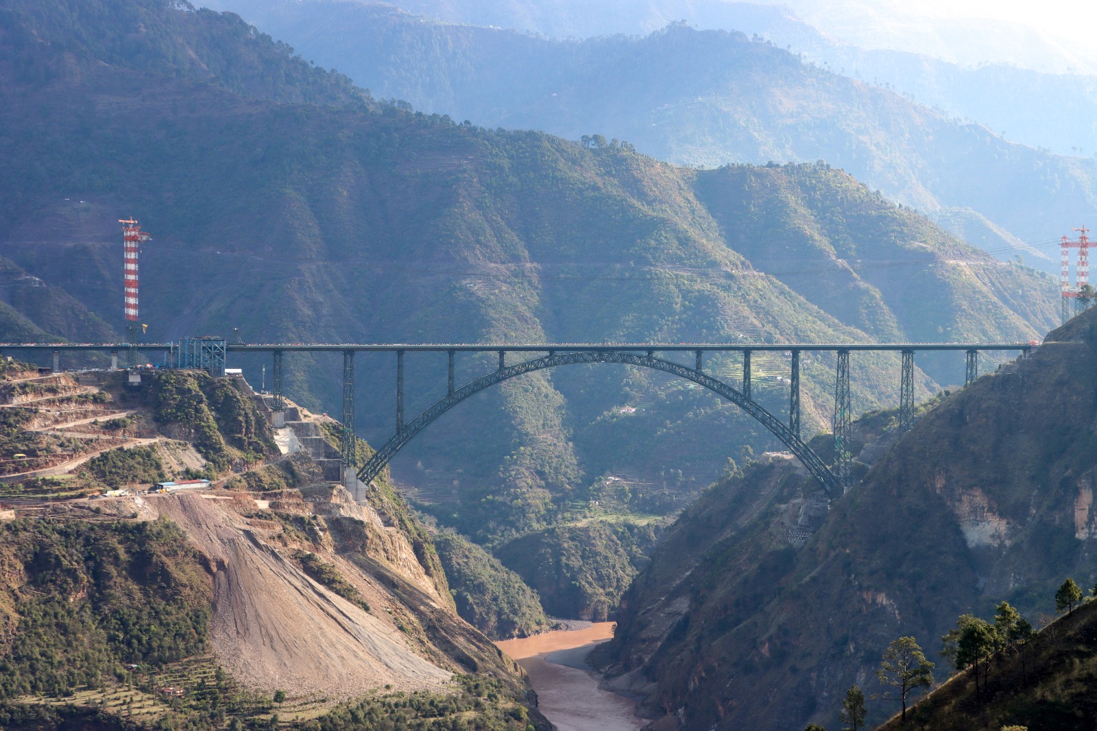 The Chenab Rail Bridge steel arch spanning the river gorge in Reasi, Jammu and Kashmir