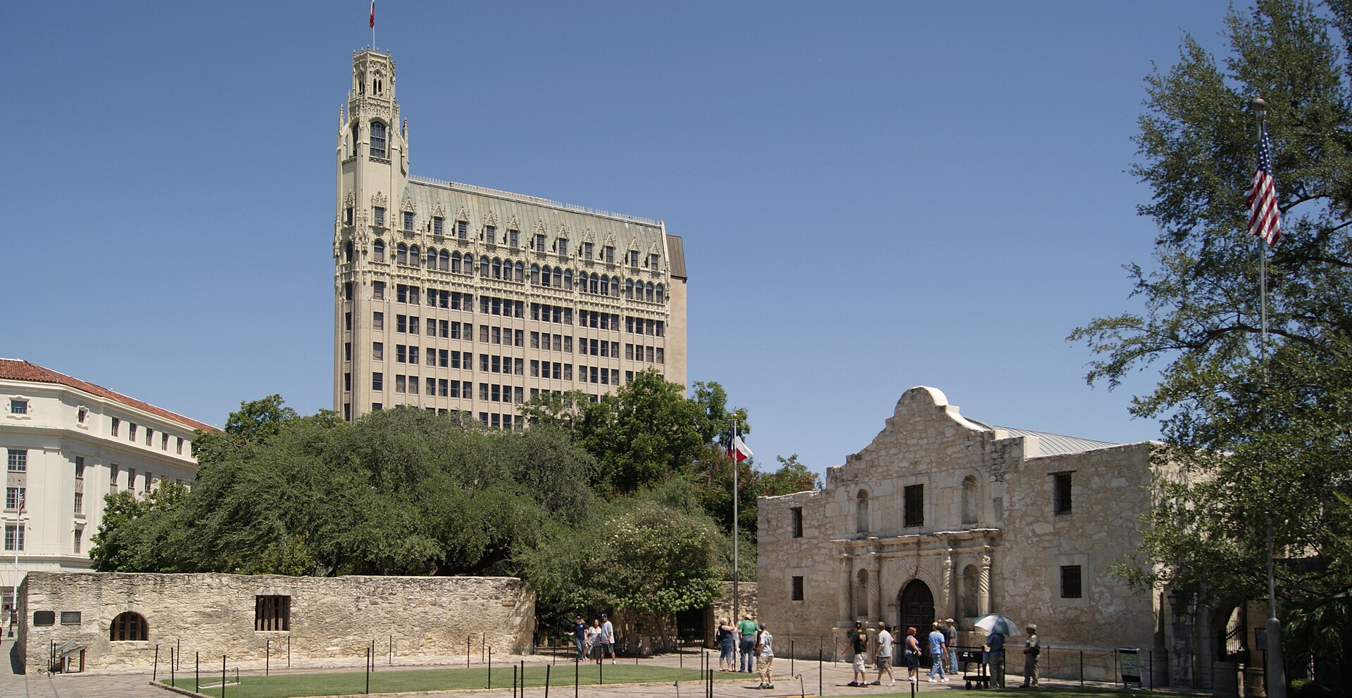 Projects The Alamo church in San Antonio with the historic multi-story buildings on the west side of Alamo Plaza behind it