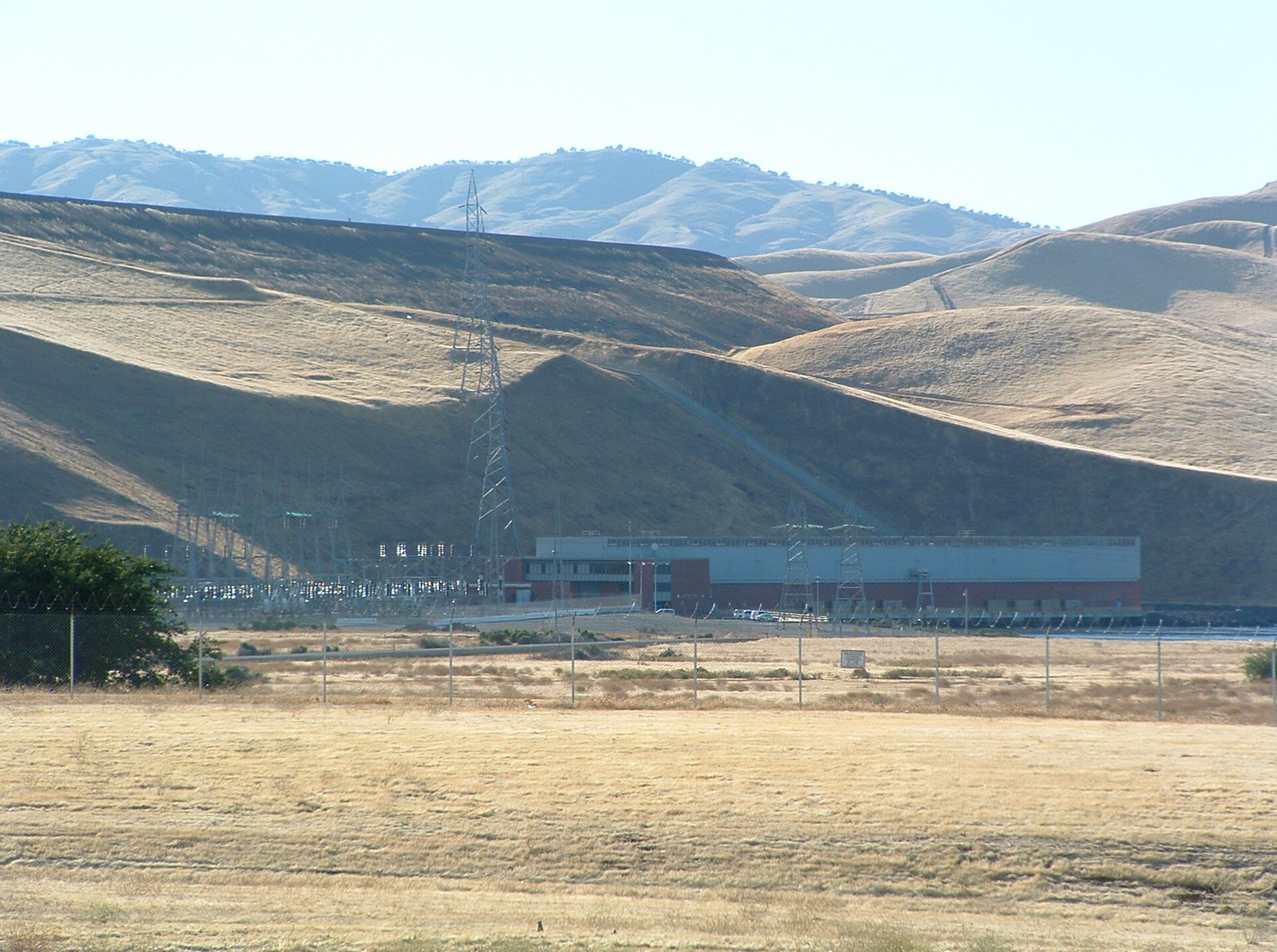 B.F. Sisk Dam embankment and the Gianelli Pumping-Generating Plant at San Luis Reservoir, California