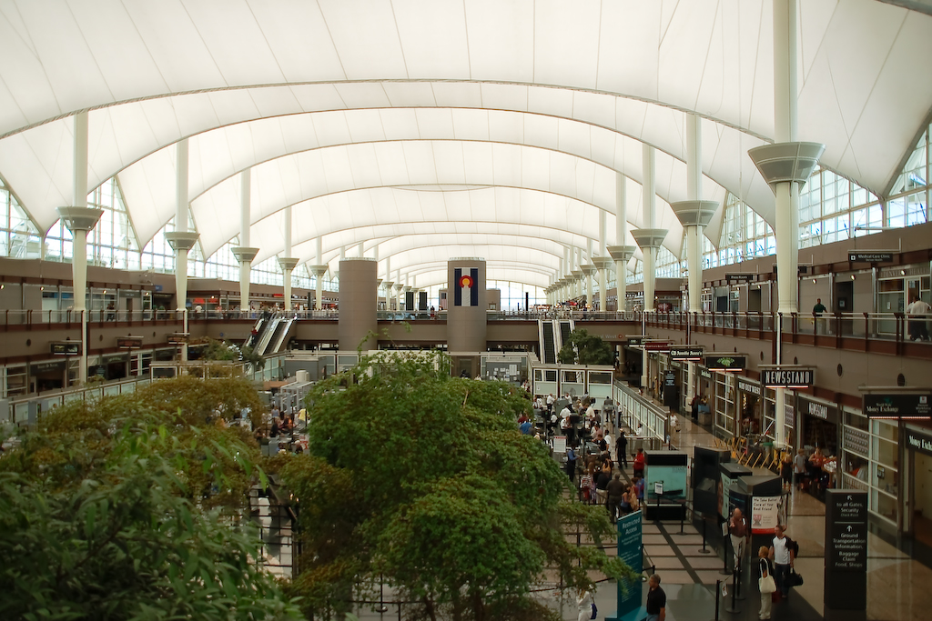 Interior of the Jeppesen Terminal great hall at Denver International Airport under its tented roof