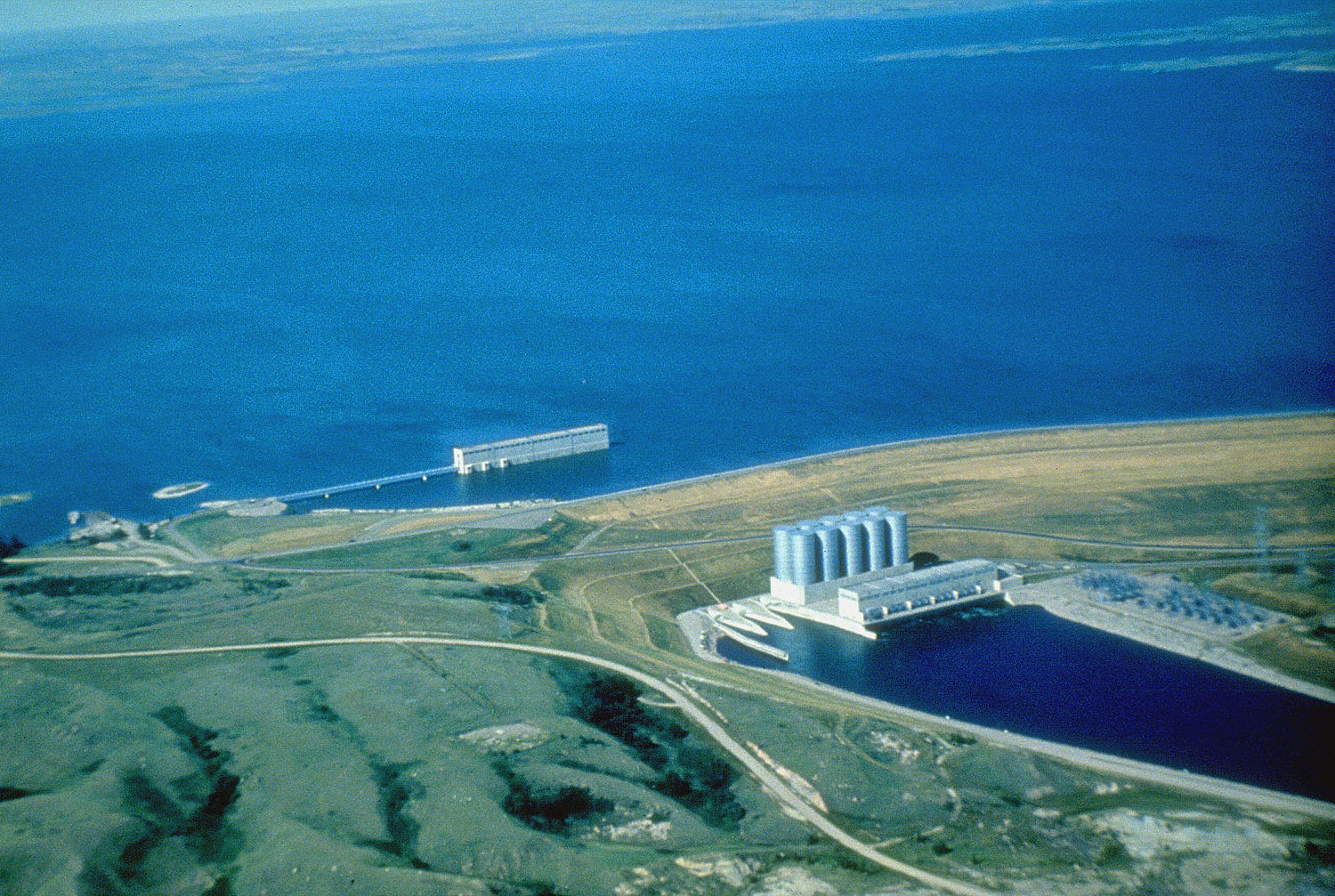 Aerial view of Garrison Dam and its powerhouse on Lake Sakakawea in North Dakota