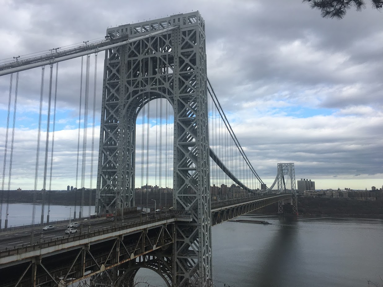 The George Washington Bridge east tower and main cables over the Hudson River