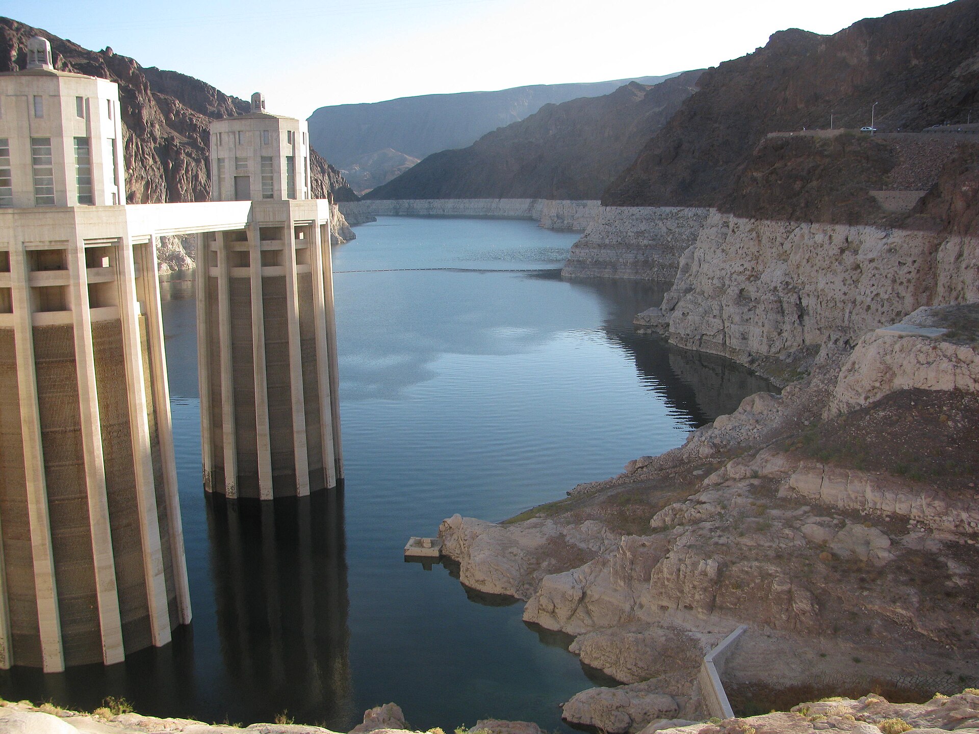 Hoover Dam with the pale bathtub ring on the canyon walls marking Lake Mead's former water level