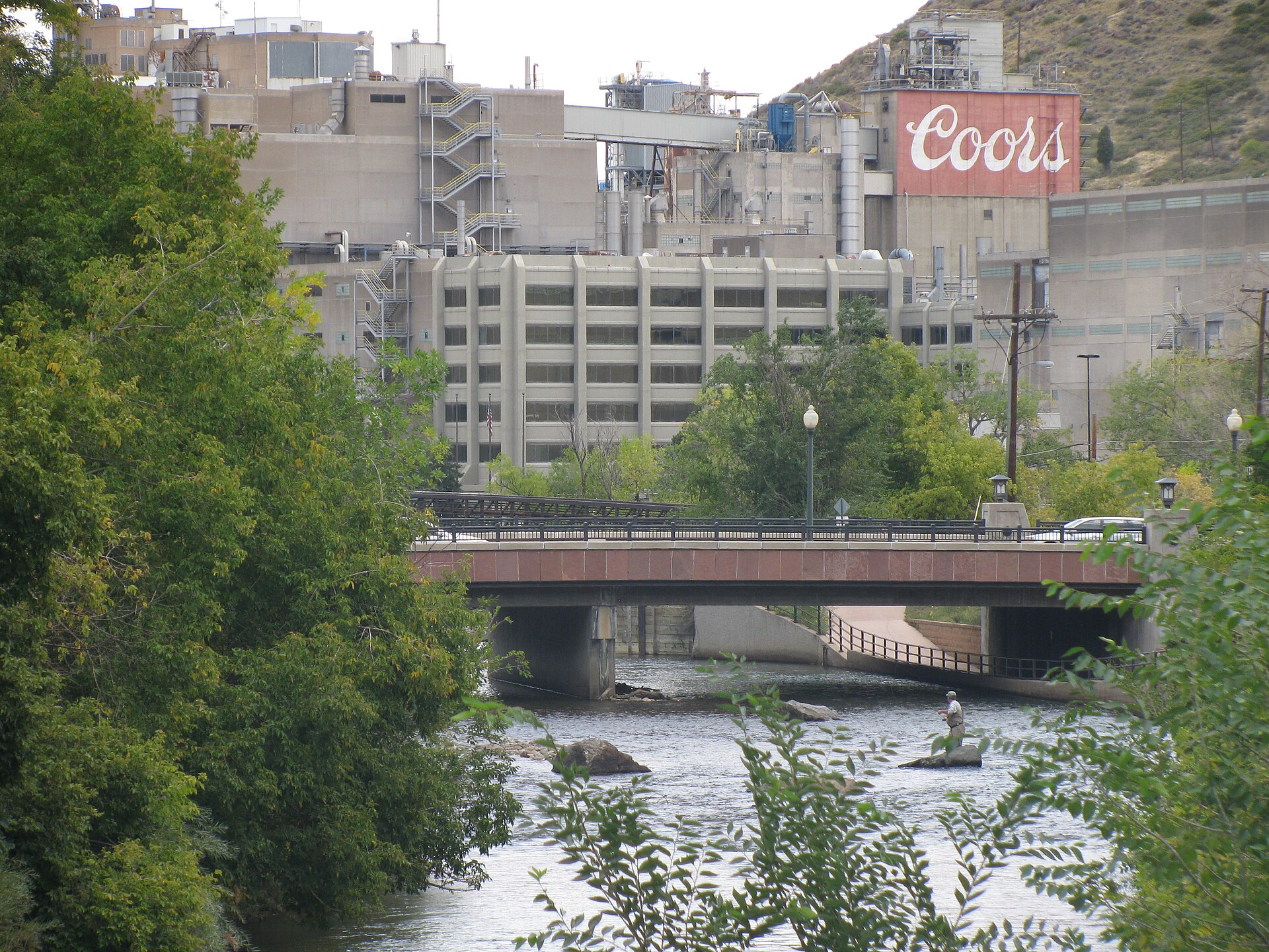 The Coors brewery complex in Golden, Colorado, with Clear Creek in the foreground