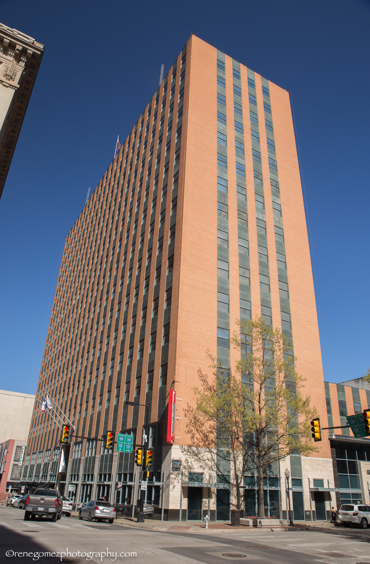 The 1952 Fort Worth National Bank building at 115 West 7th Street, a 16-story International Style tower clad in rust-colored brick