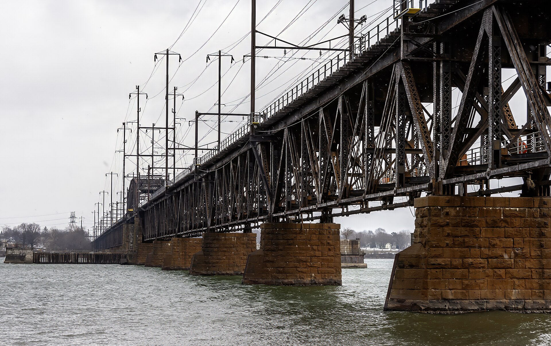 The existing Amtrak Susquehanna River rail bridge, a long steel truss structure on masonry piers between Havre de Grace and Perryville, Maryland