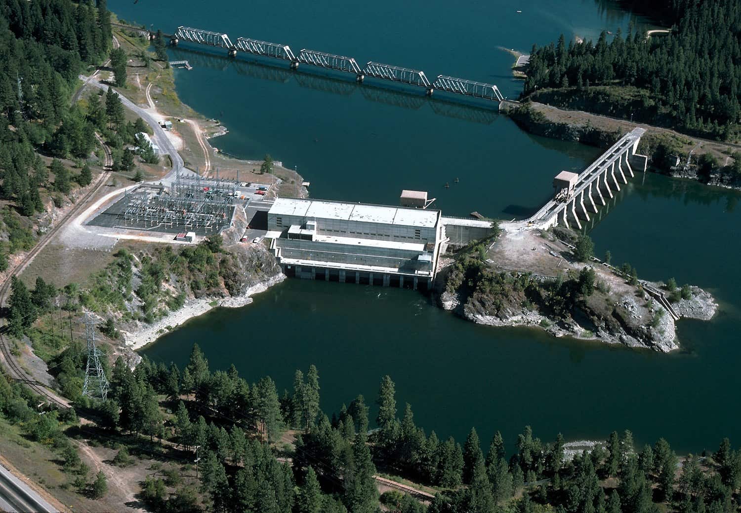 Aerial view of Albeni Falls Dam and its spillway bays on the Pend Oreille River in northern Idaho