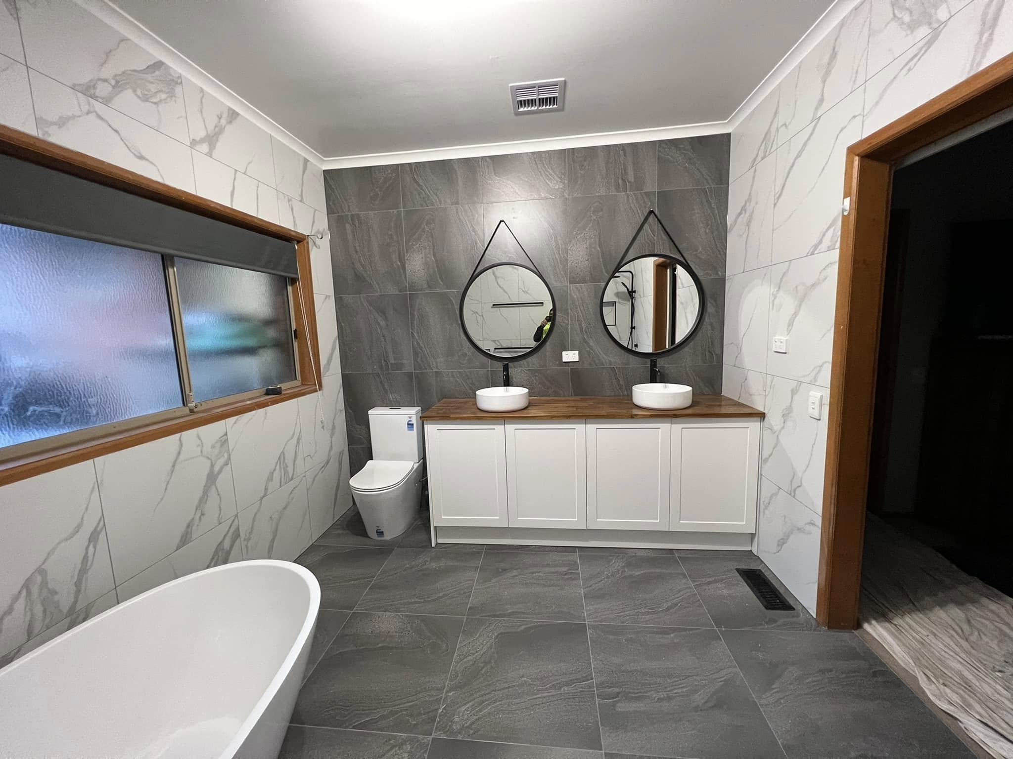 Companies Mono Tiling Bathroom Renovation — Stone and Tile