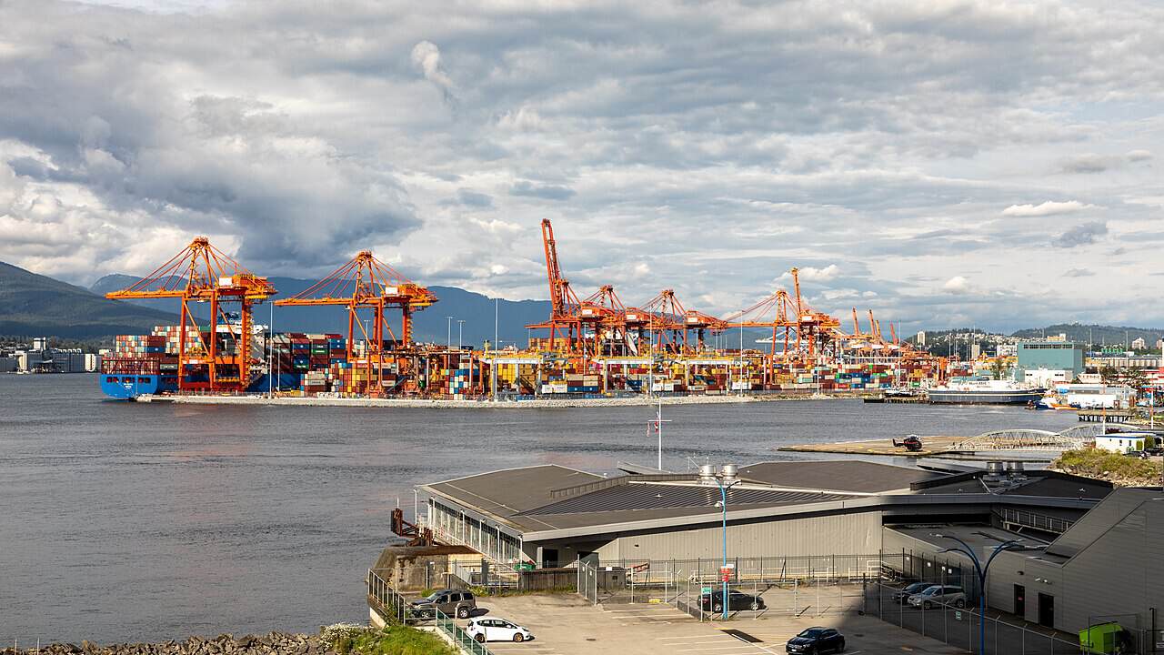 New Tariffs Hit Steel Fittings and Welding Inputs From Canada. Cement Came Off the List. Container cranes and stacked shipping containers at a Vancouver marine terminal