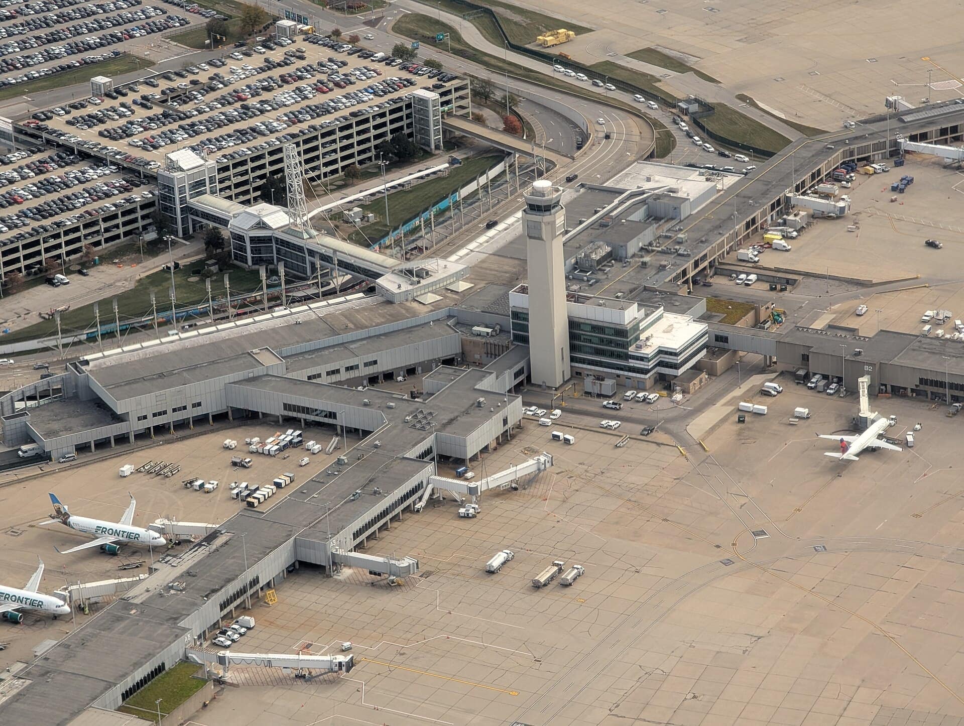 Aerial view of the existing terminal, concourses and air traffic control tower at Cleveland Hopkins International Airport