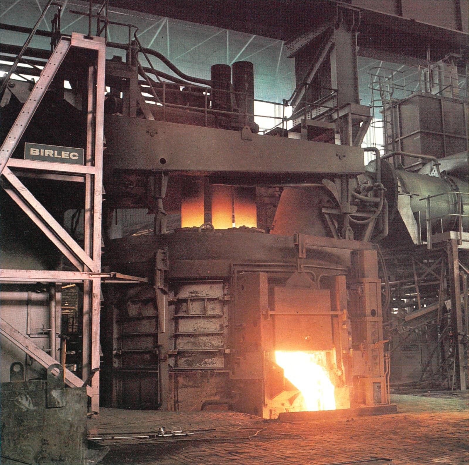 Electric arc furnace pouring inside a steel works