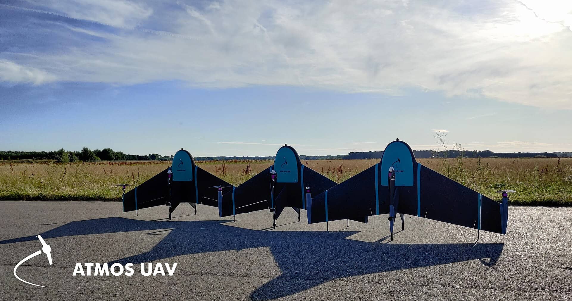 Procore Closed the $845M DroneDeploy Deal. Selling It to Contractors Is the Next Job. Fixed-wing survey drones staged in a field before a mapping flight