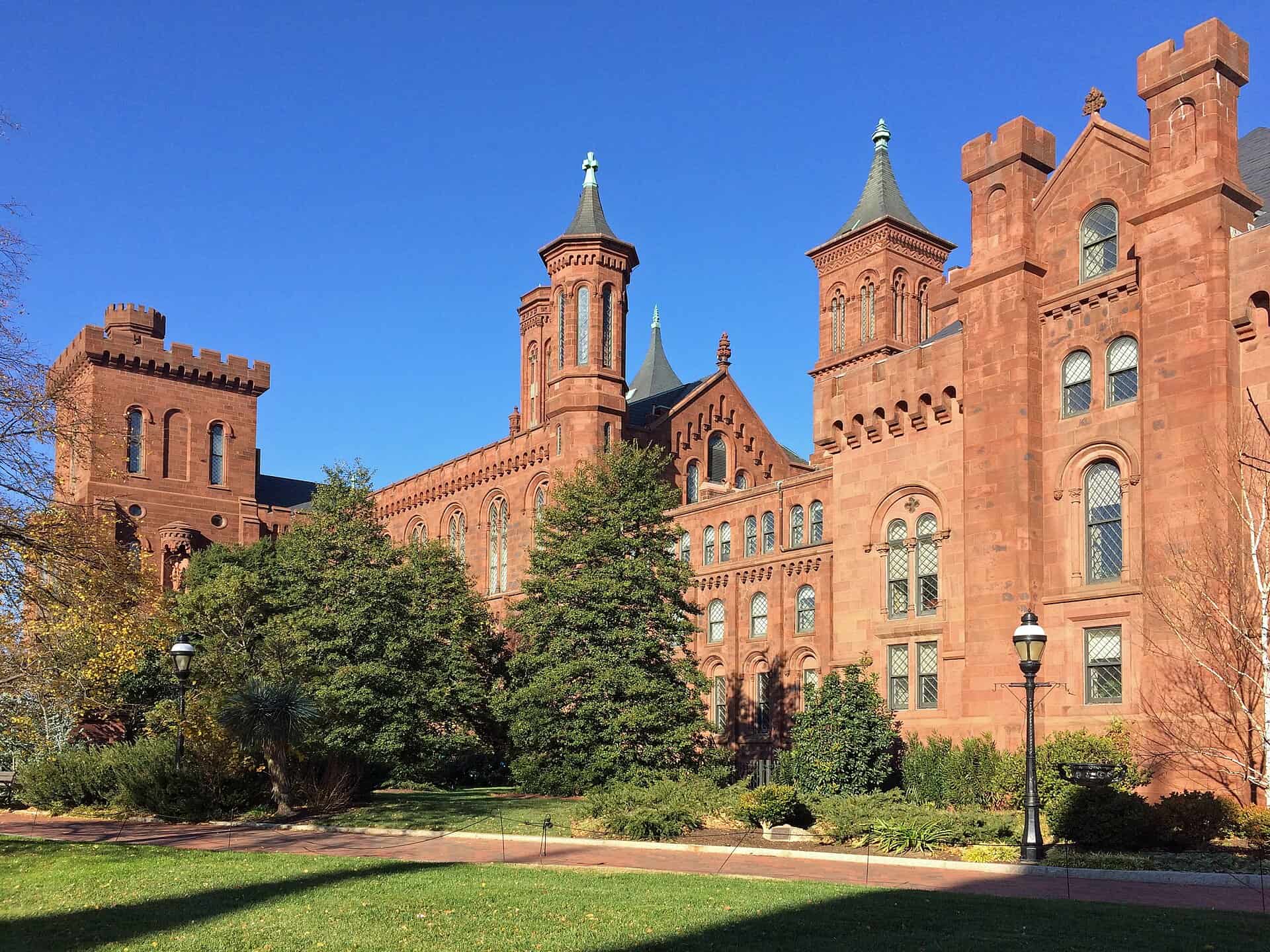 South elevation of the Smithsonian Institution Building in red Seneca sandstone, seen across the Enid A. Haupt Garden