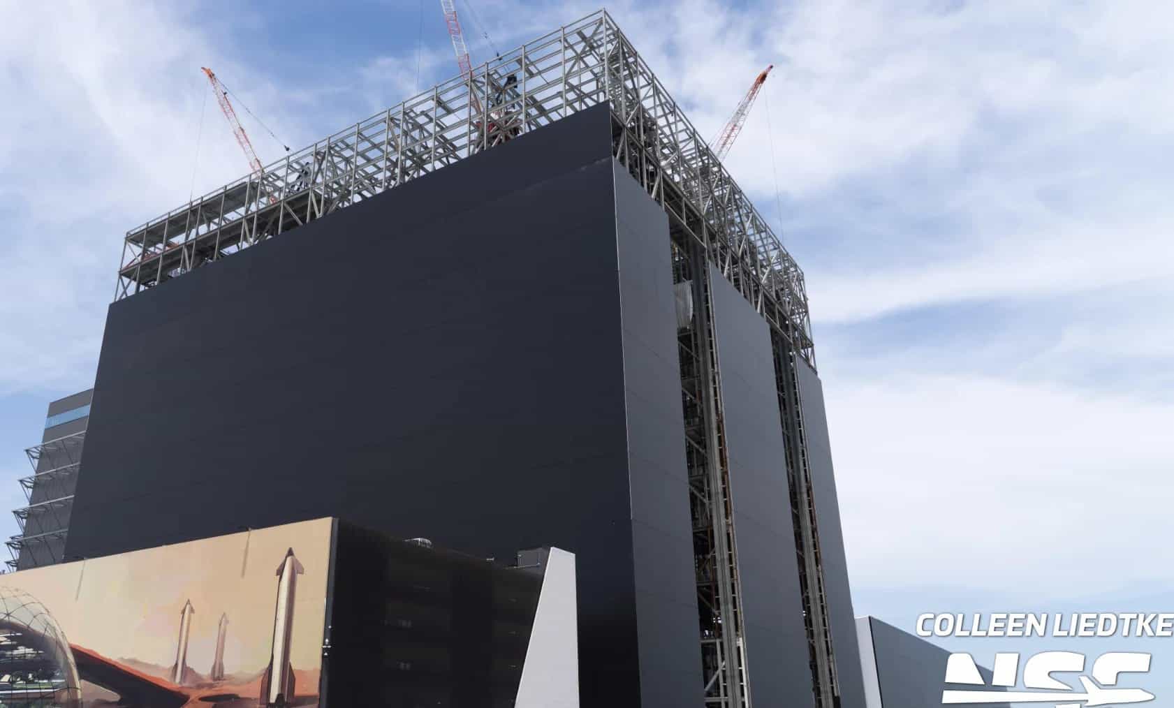 Steel frame of the SpaceX Gigabay vertical integration building rising at Starbase, Texas