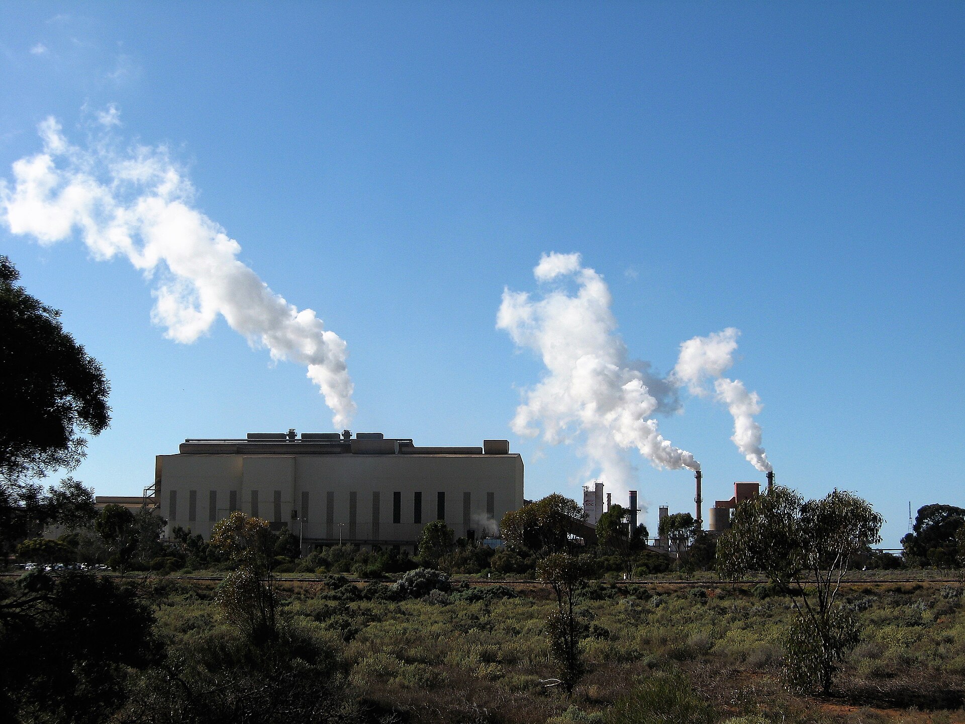 The Whyalla steelworks in South Australia venting steam, with the blast furnace and stacks in view