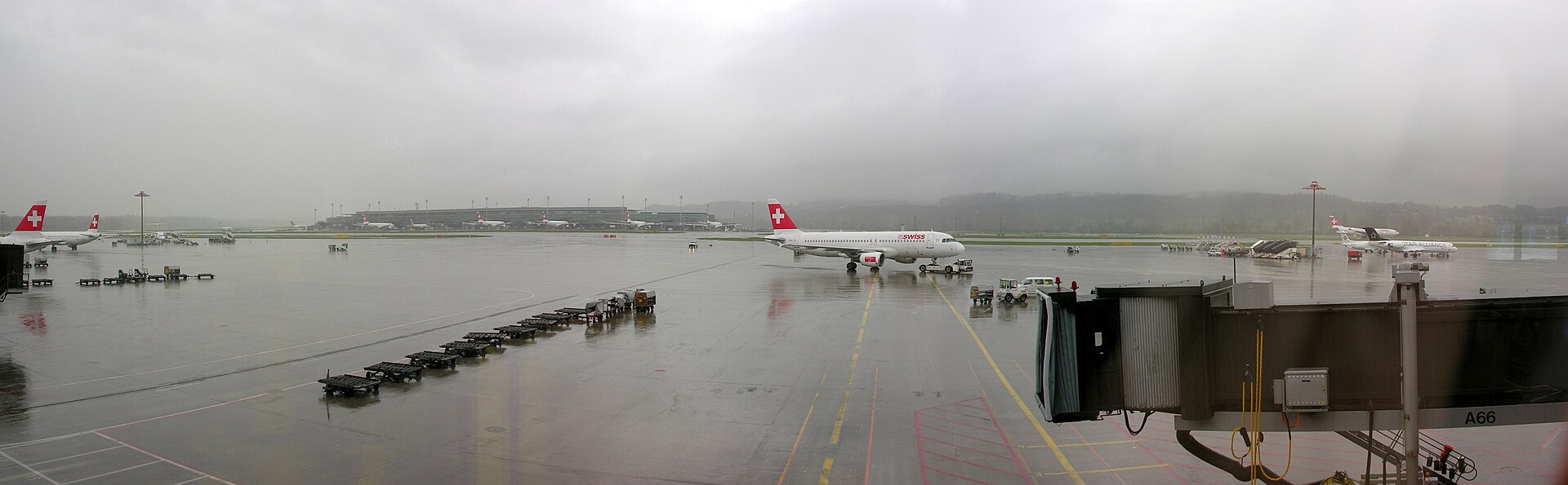 The 1985 Dock A pier at Zurich Airport with aircraft on stand at the gates