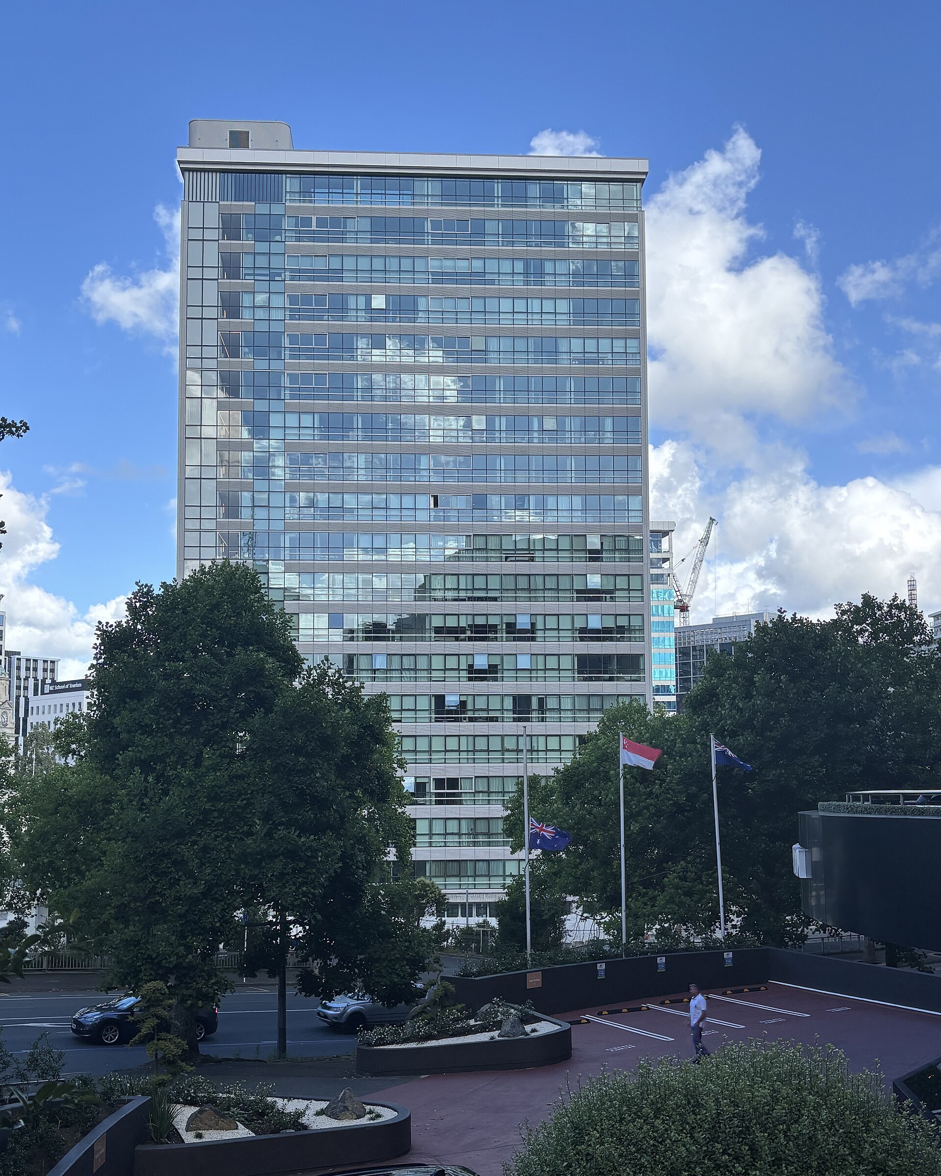 Full height of the converted tower with its new glazed facade, December 2025, seen from near the Grand Millennium Hotel